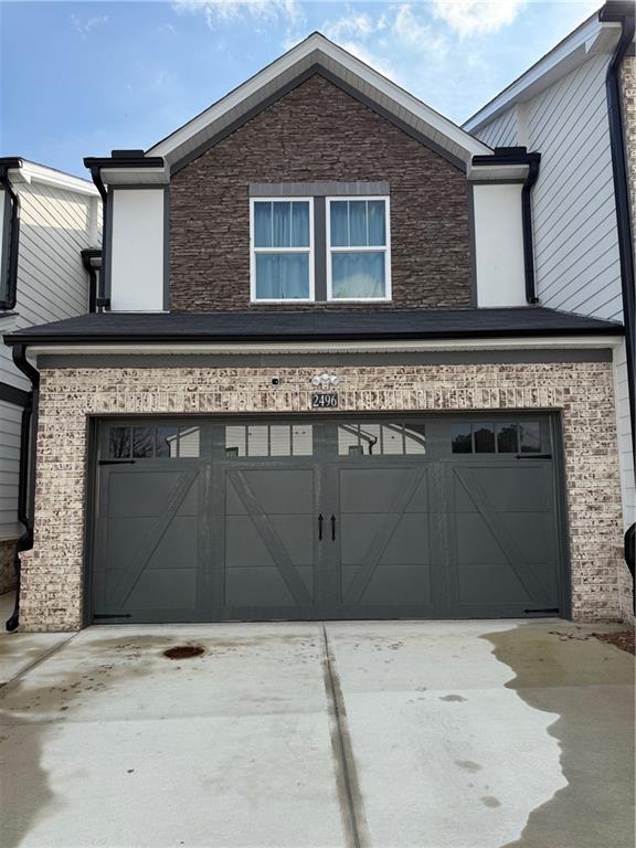 2496 Rocky City Lane Snellville, GA 30078 - Photo 2 of 15 front view of a house