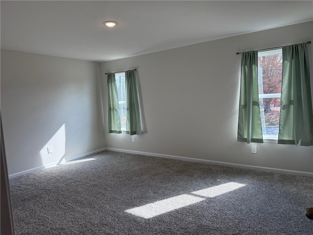 2496 Rocky City Lane Snellville, GA 30078 - Photo 3 of 15 an empty room with windows
