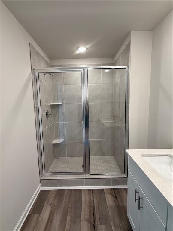 2496 Rocky City Lane Snellville, GA 30078 - Photo 8 of 15 a bathroom with a shower and a sink