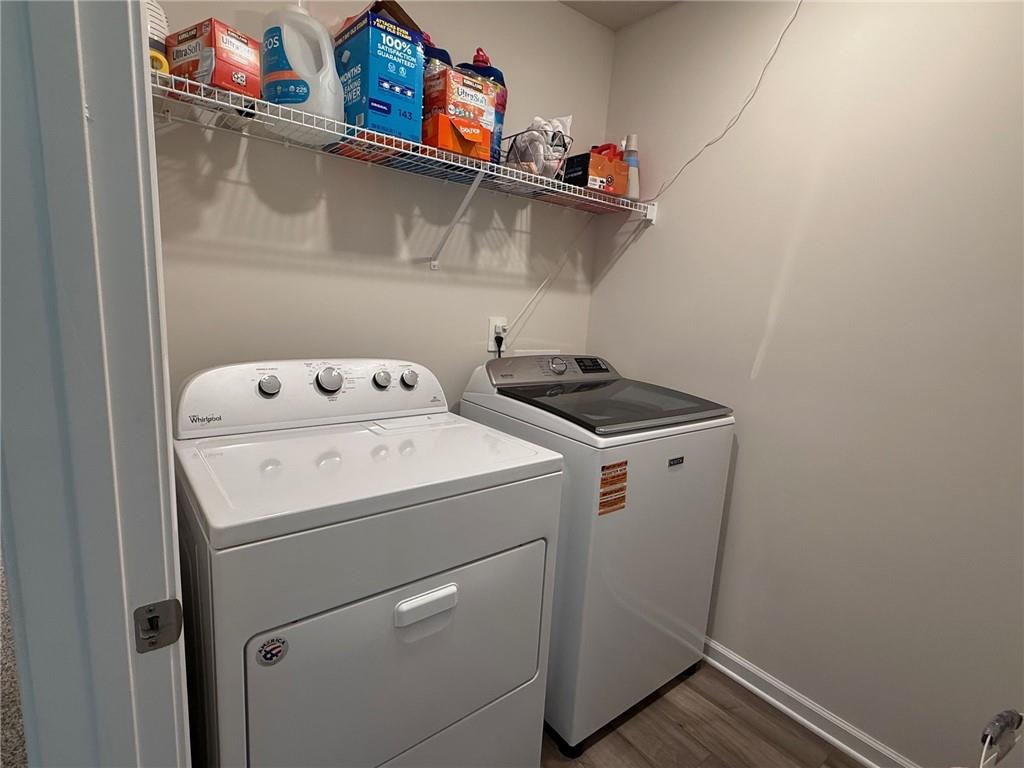 2496 Rocky City Lane Snellville, GA 30078 - Photo 10 of 15 a utility room with dryer and washer