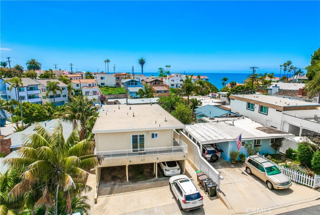 a view of a patio with furniture and a potted plant