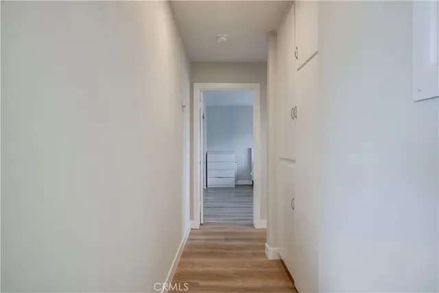 a view of a bathroom from a hallway