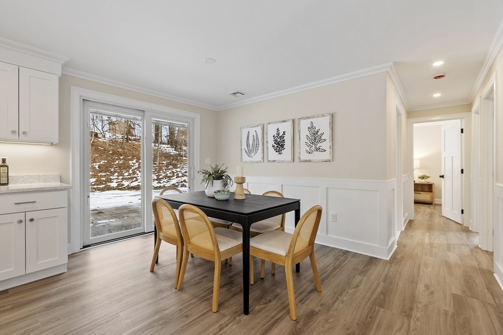 4 Richard Road Hudson, MA 01749 - Photo 14 of 40 a view of a dining room with furniture window and wooden floor