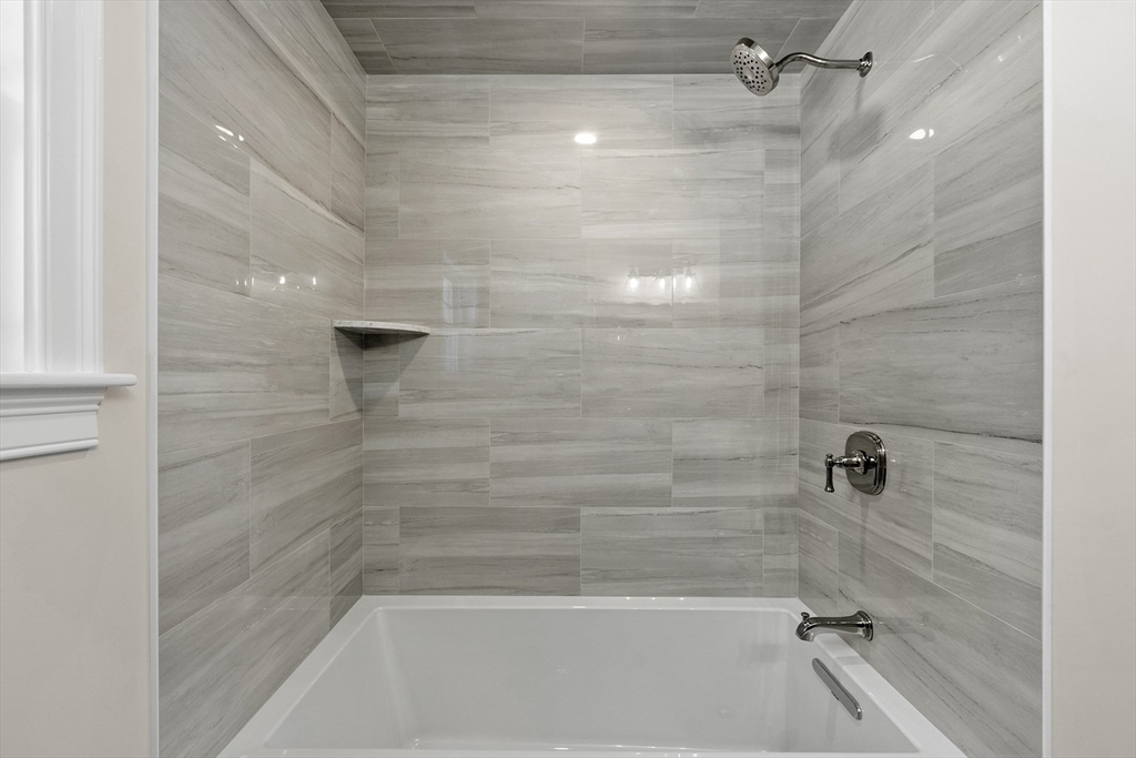 4 Richard Road Hudson, MA 01749 - Photo 20 of 40 a close view of a bathtub in bathroom