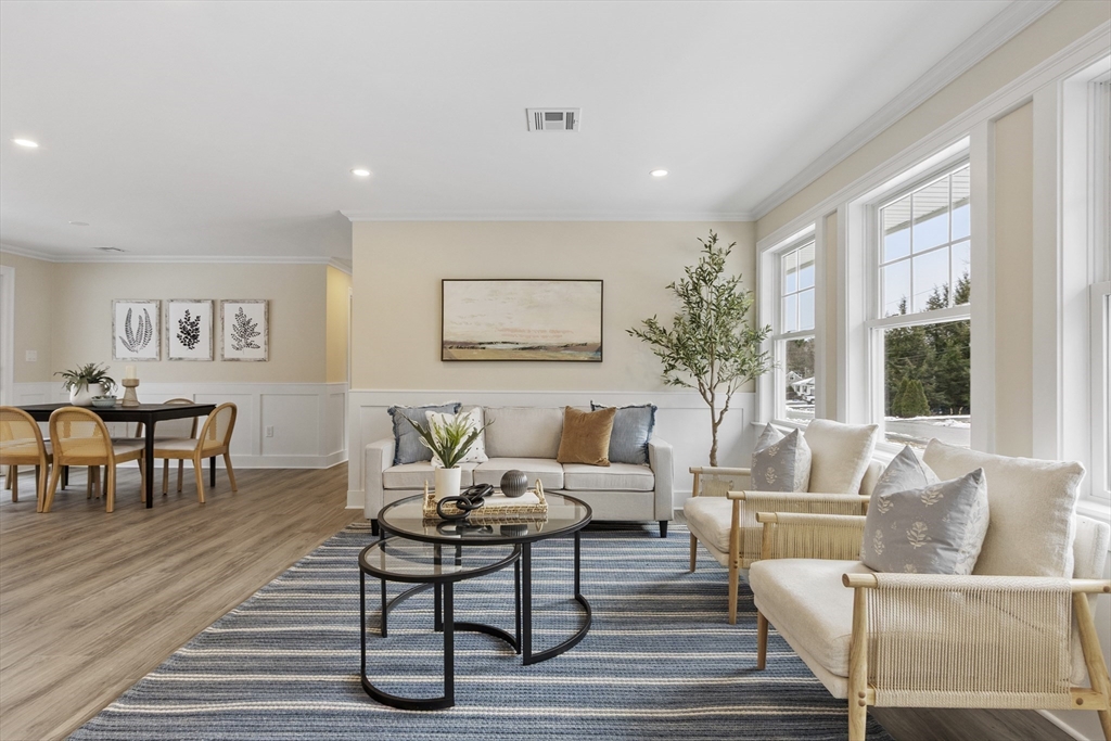 4 Richard Road Hudson, MA 01749 - Photo 2 of 40 a living room with furniture wooden floor and a table