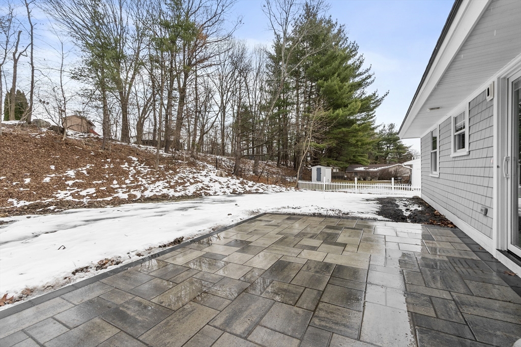 4 Richard Road Hudson, MA 01749 - Photo 33 of 40 a view of a yard with snow on the road
