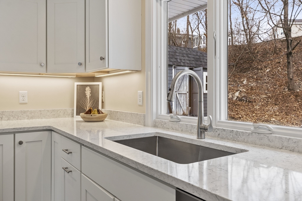 4 Richard Road Hudson, MA 01749 - Photo 10 of 40 a view of a kitchen sink with cabinets