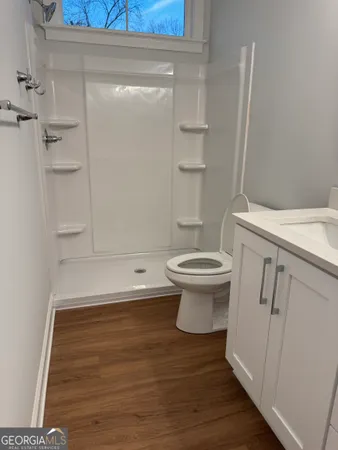 a bathroom with a sink and a toilet