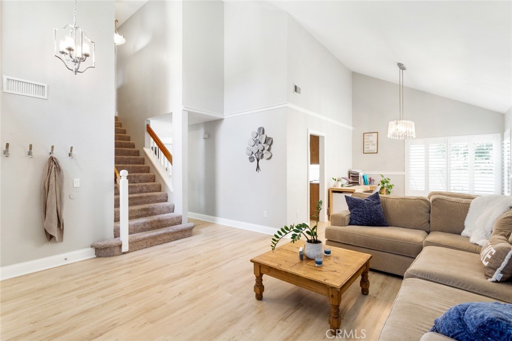 1942 Silverwood Circle Corona, CA 92881 - Photo 24 of 24 a living room with furniture and wooden floor