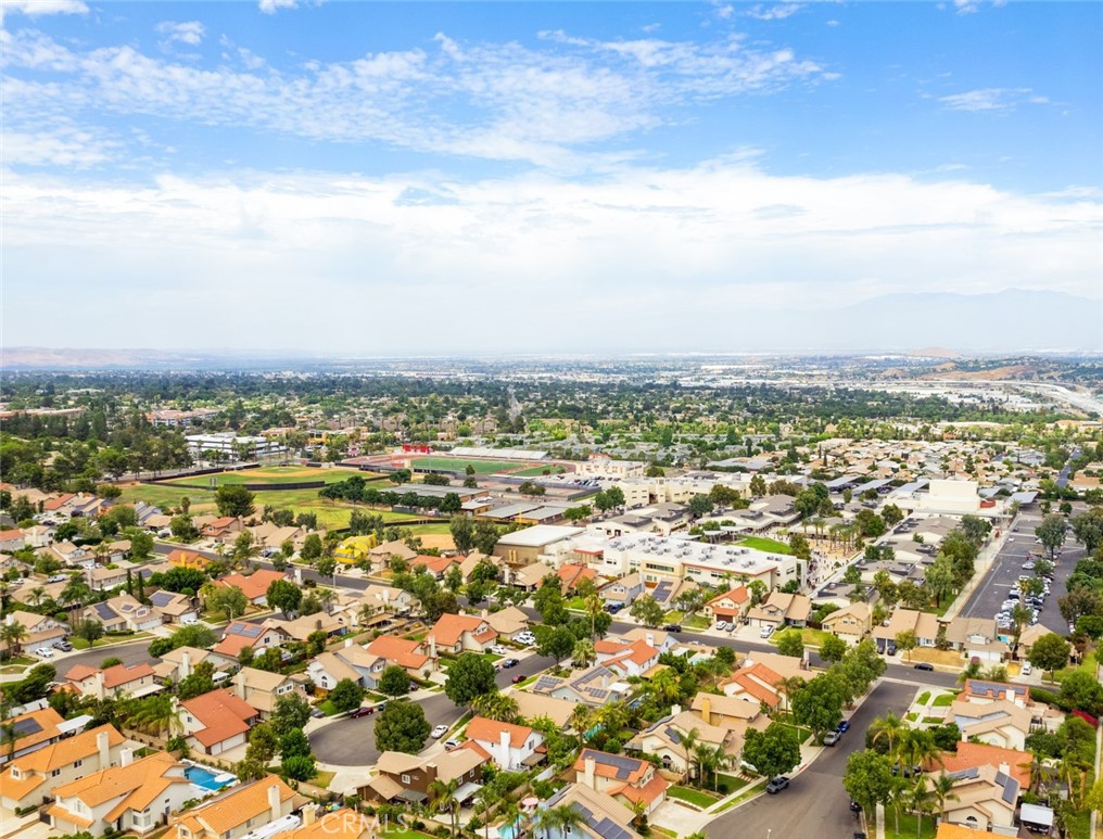 1942 Silverwood Circle Corona, CA 92881 - Photo 22 of 24 an aerial view of residential building with green space
