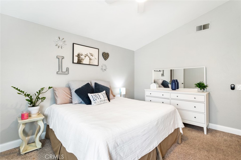 1942 Silverwood Circle Corona, CA 92881 - Photo 3 of 24 a bedroom with a bed and a dresser