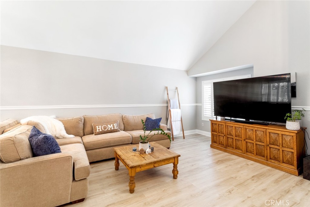 1942 Silverwood Circle Corona, CA 92881 - Photo 6 of 24 a living room with furniture and a flat screen tv