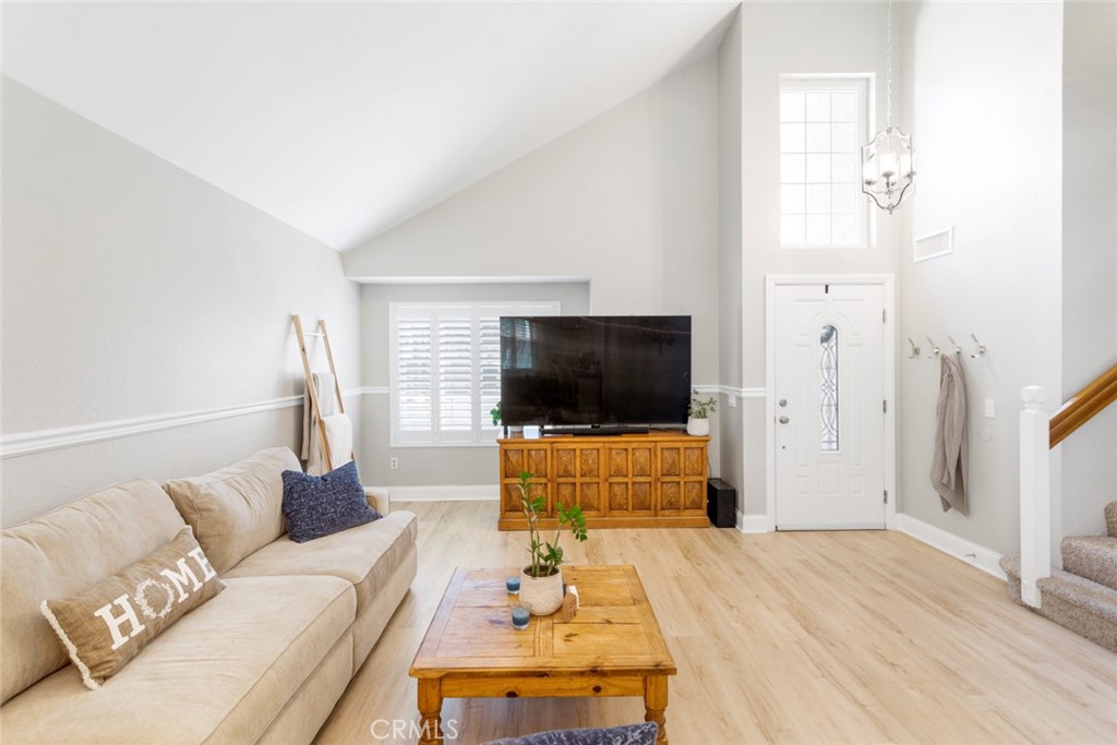 1942 Silverwood Circle Corona, CA 92881 - Photo 7 of 24 a living room with furniture and a flat screen tv