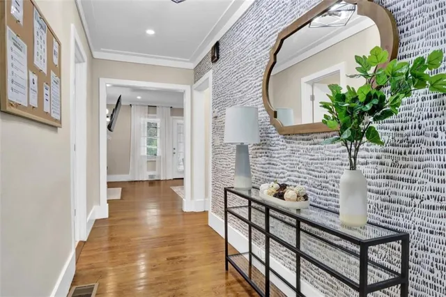 wooden floor with a potted plant on a table