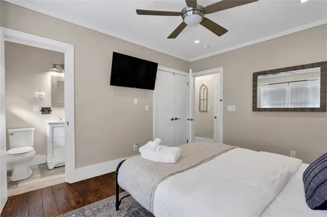 a front view of a house with a yard table and chairs