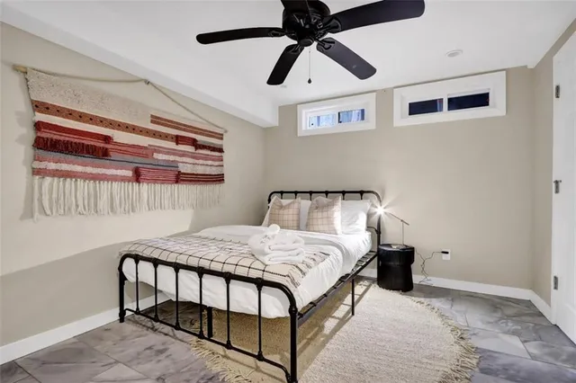 a bathroom with a sink toilet and mirror