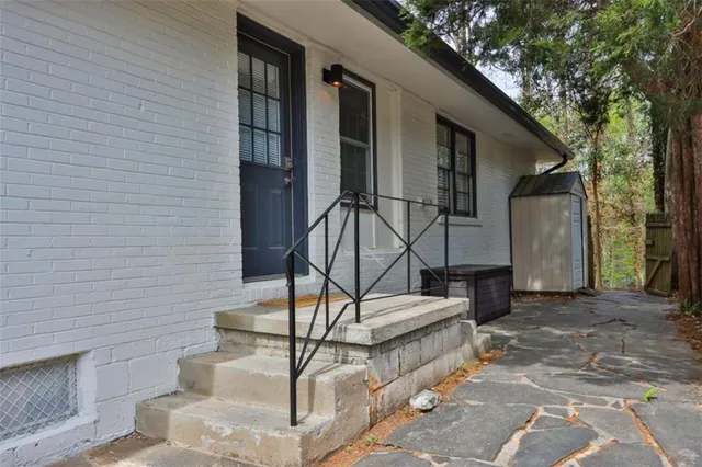 a view of fountain in front of a building