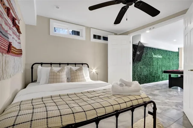 a kitchen with cabinets stainless steel appliances granite countertop a sink and cabinets