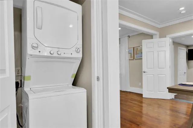 a view of bathroom with a washer and dryer
