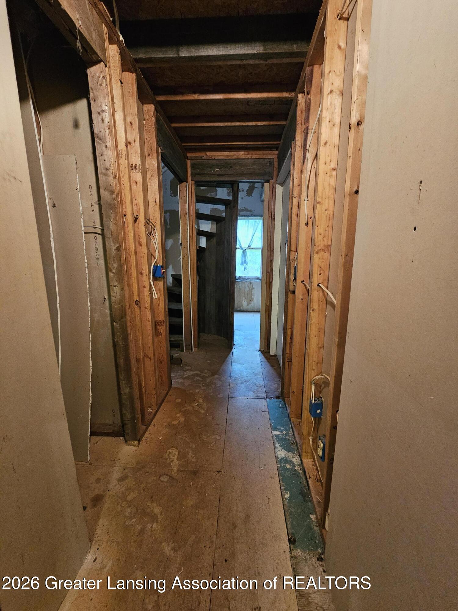 14540 South Wacousta Road Grand Ledge, MI 48837 - Photo 22 of 48 Hallway to unfinished area