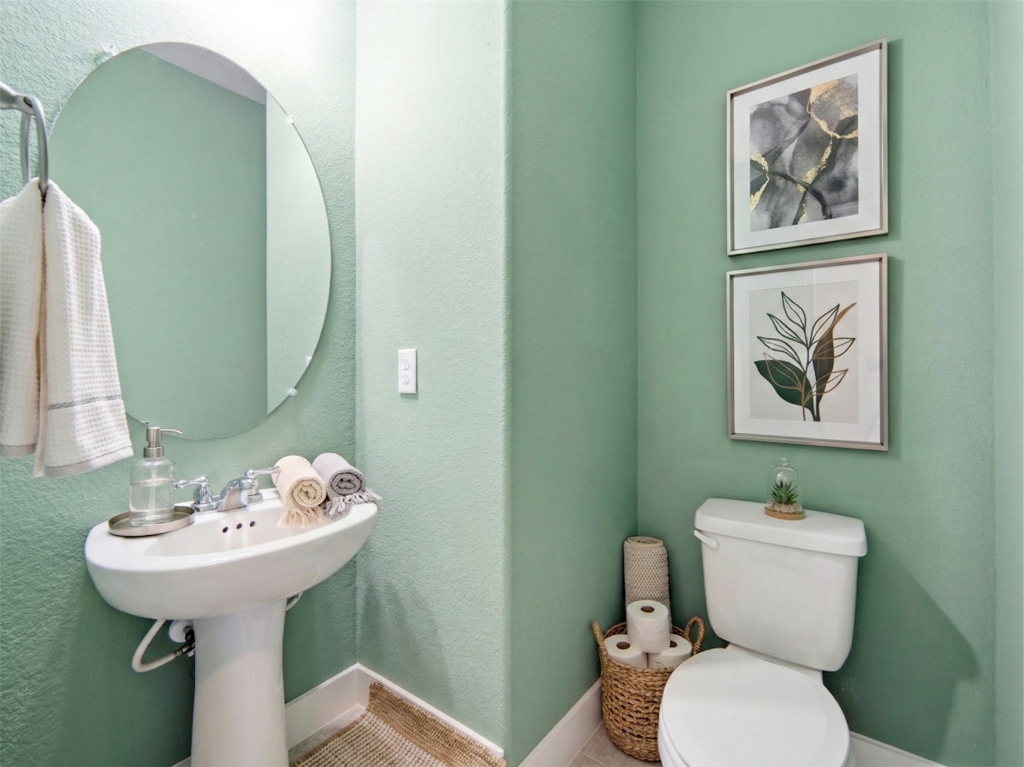 6916 Cardinal Bloom Loop Austin, TX 78744 - Photo 14 of 37 a bathroom with a toilet a sink and mirror
