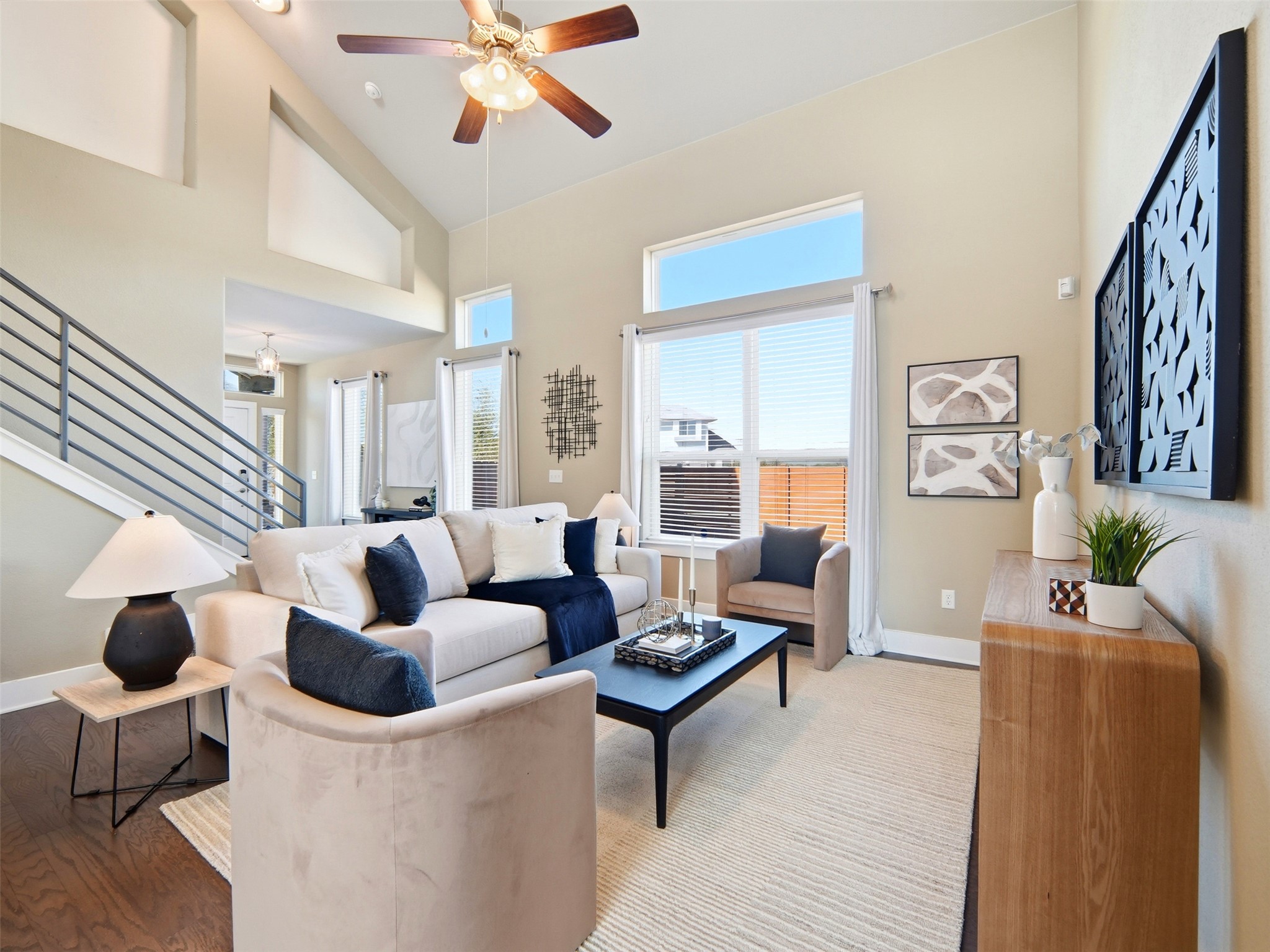 6916 Cardinal Bloom Loop Austin, TX 78744 - Photo 7 of 37 a living room with furniture and wooden floor