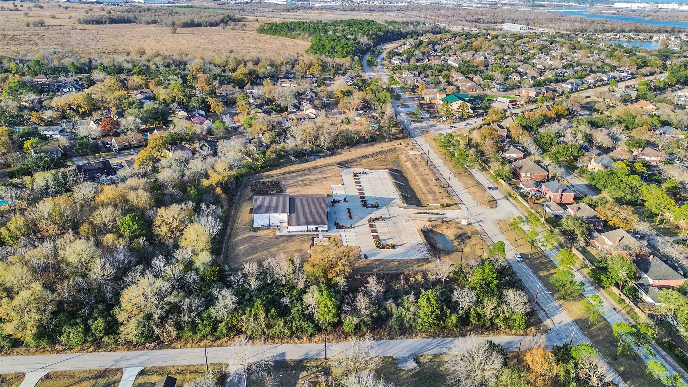 0 Memory Lane Seabrook, TX 77586 - Photo 11 of 11 an aerial view of residential houses with outdoor space