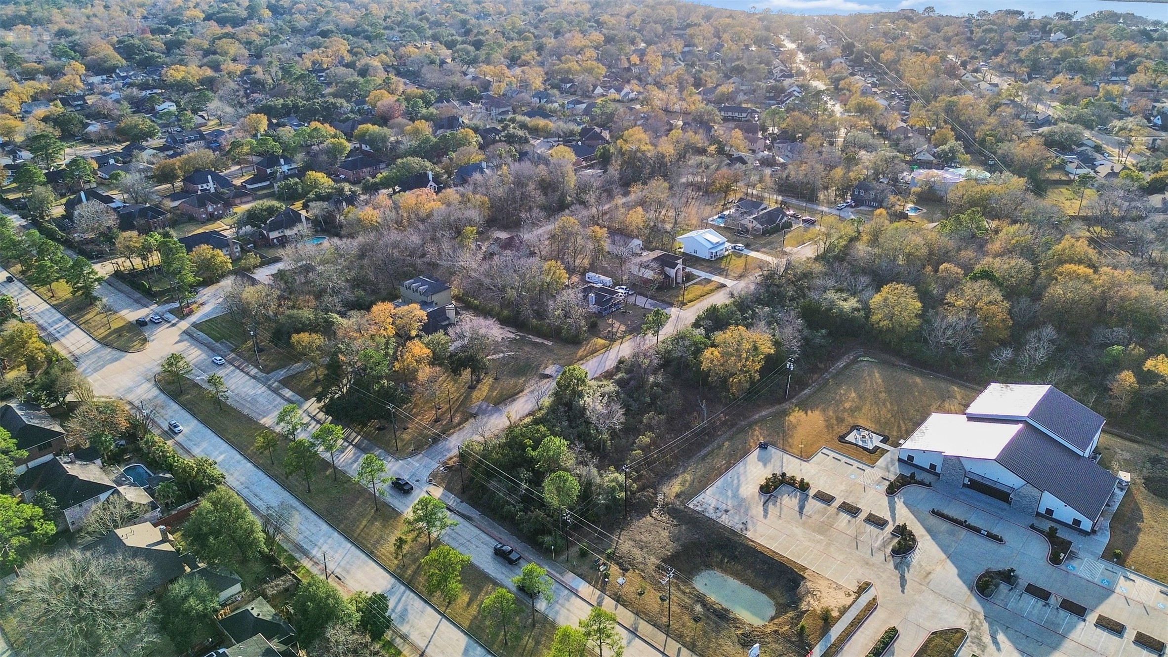 0 Memory Lane Seabrook, TX 77586 - Photo 5 of 11 an aerial view of residential houses with outdoor space