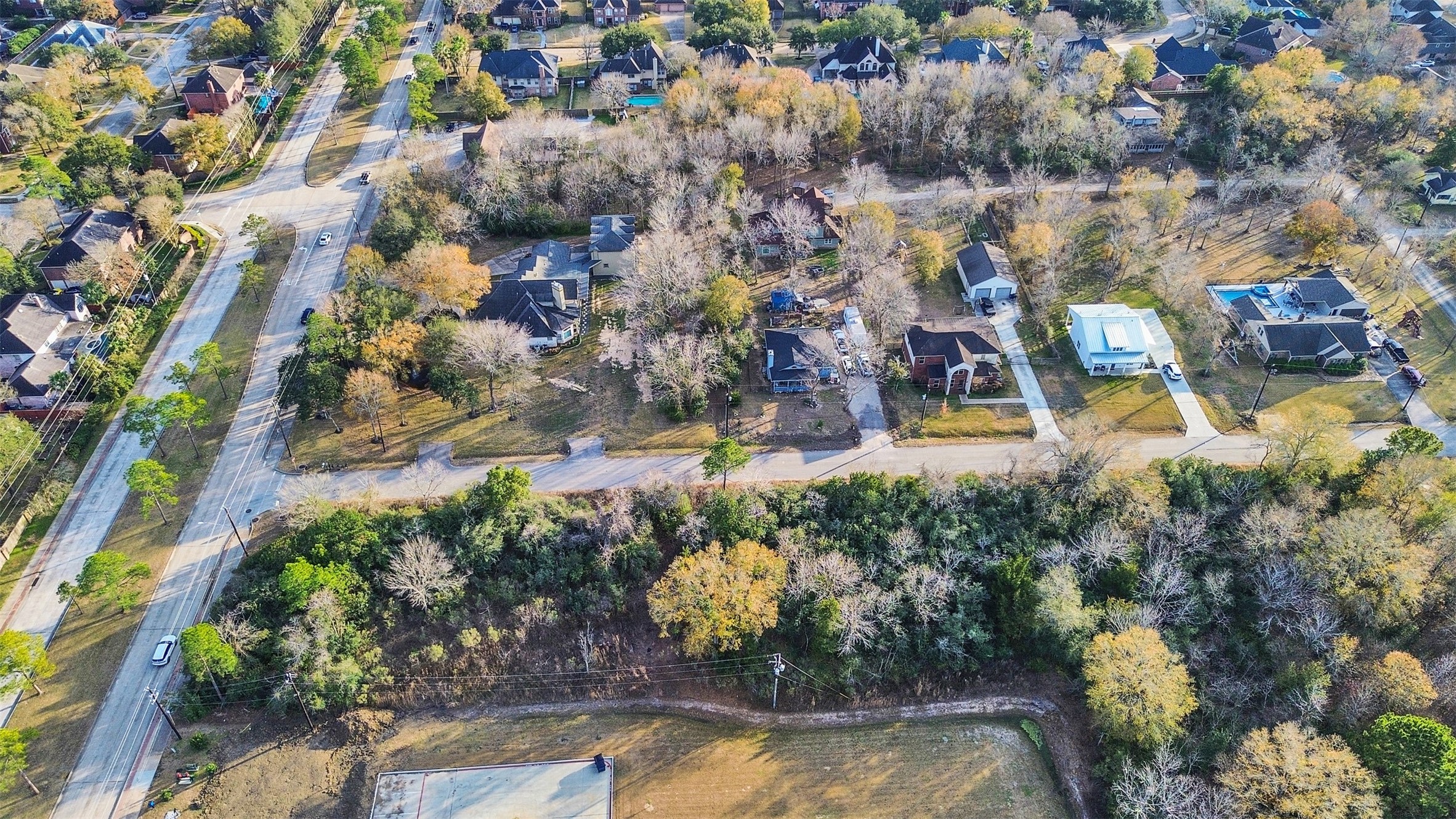 0 Memory Lane Seabrook, TX 77586 - Photo 6 of 11 a view of swimming pool and lake view