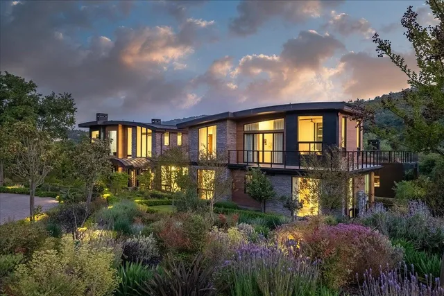 a room with gym equipment and a large window