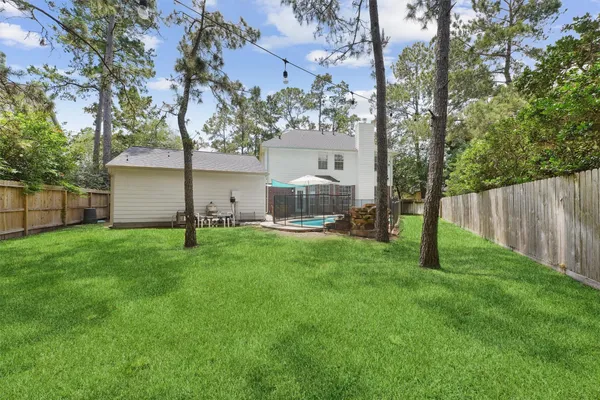 $680,000 | 74 West Summer Storm Circle, The Woodlands, TX 77381
