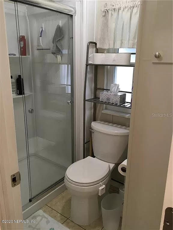 133 Bayou Drive Satsuma, FL 32189 - Photo 15 of 30 a bathroom with a toilet and a shower