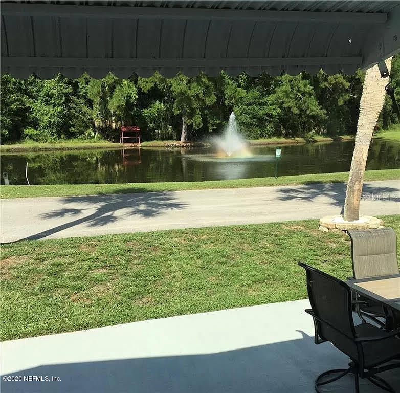 133 Bayou Drive Satsuma, FL 32189 - Photo 22 of 30 a view of a swimming pool with a patio