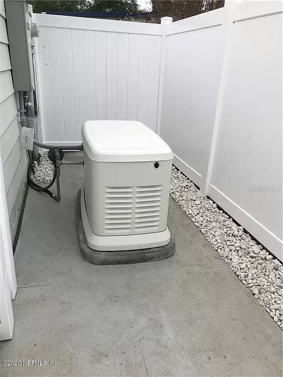 133 Bayou Drive Satsuma, FL 32189 - Photo 24 of 30 a view of a room with water heater and a cabinet