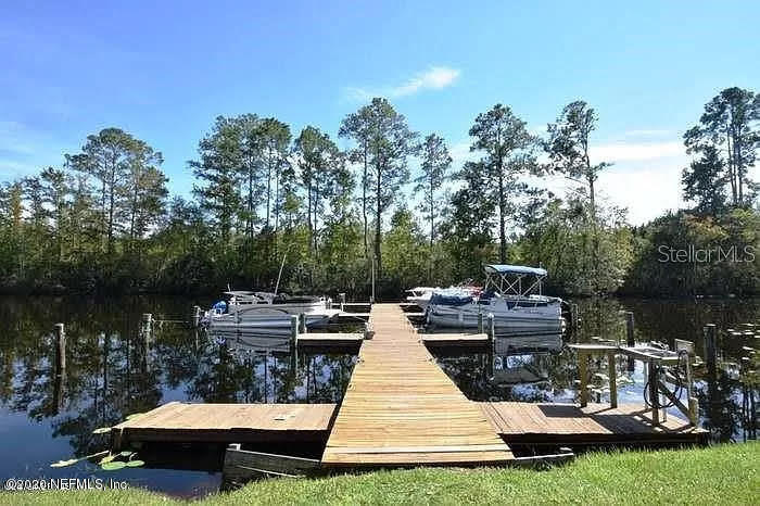133 Bayou Drive Satsuma, FL 32189 - Photo 27 of 30 a view of a lake with houses