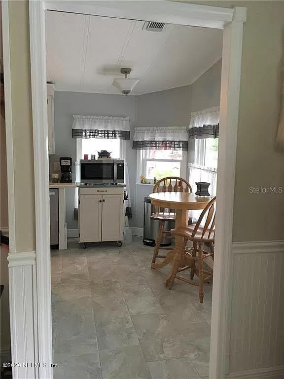 133 Bayou Drive Satsuma, FL 32189 - Photo 9 of 30 a kitchen with a sink appliances and cabinets