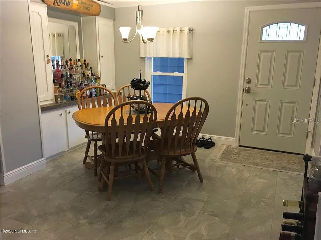 133 Bayou Drive Satsuma, FL 32189 - Photo 10 of 30 a view of a dining room with furniture