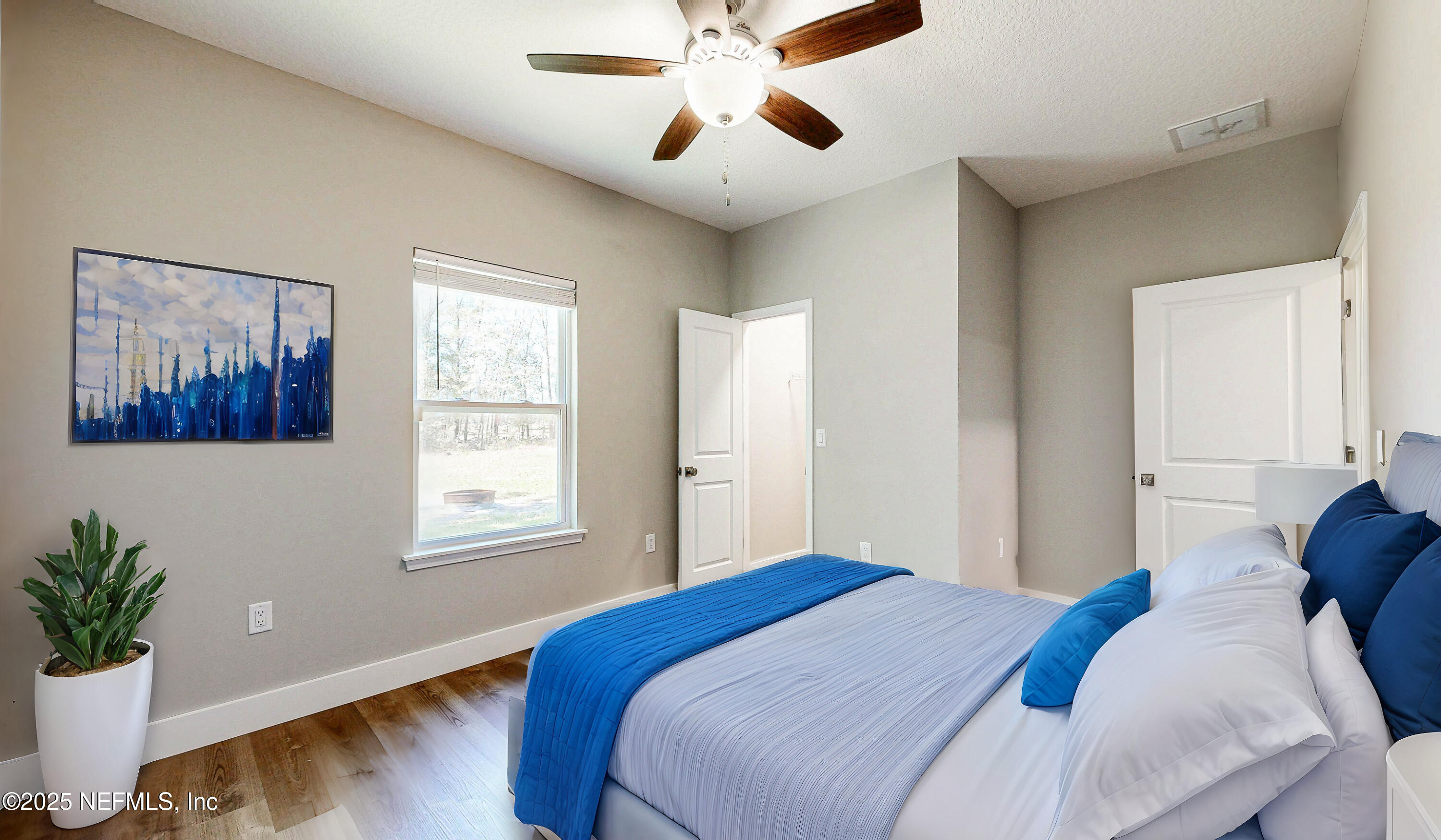 7622 Alameda Way Keystone Heights, FL 32656 - Photo 26 of 33 20250321-7622_Alameda_Way-111 - Bedroom