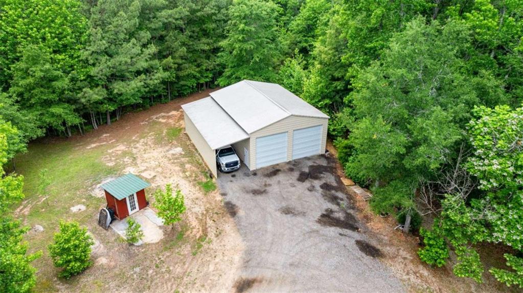 128 Byrom Road Senoia, GA 30276 - Photo 66 of 83 a view of a backyard with a lake view