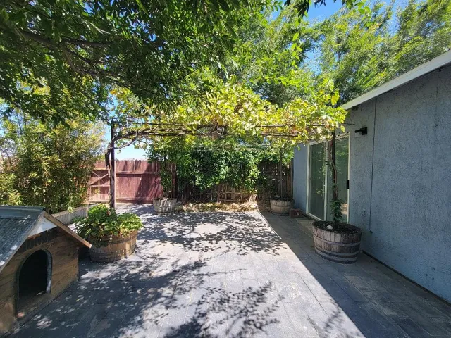 a view of a pathway with a yard