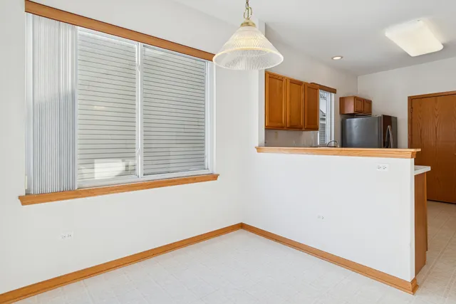 a view of a room with a large window