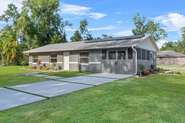a view of outdoor space yard and front view of a house