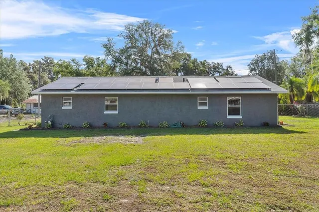 a view of a swimming pool with an outdoor space