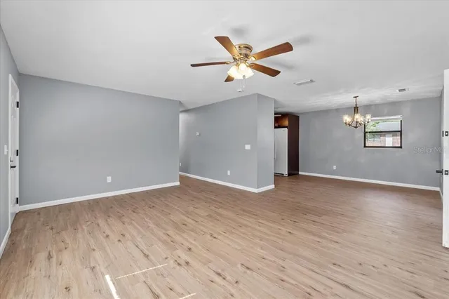 a view of an empty room and window