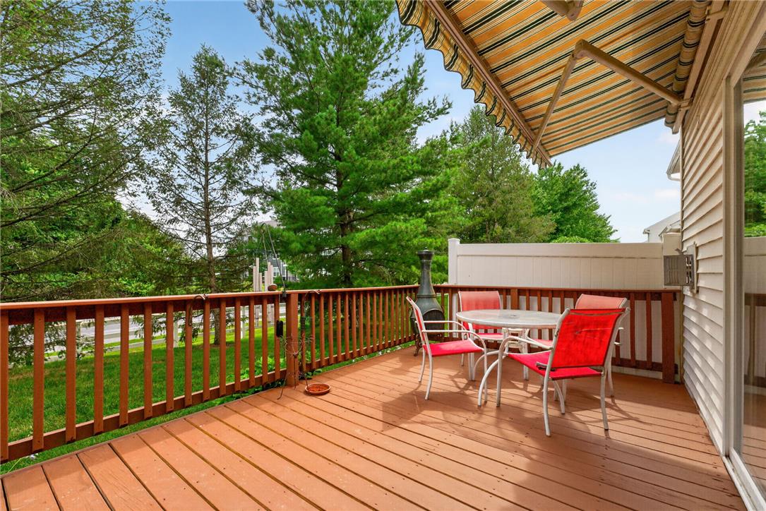 198 Park Ridge Drive Easton, PA 18040 - Photo 26 of 28 An inviting deck, shaded by an awning, offers a perfect outdoor retreat.
