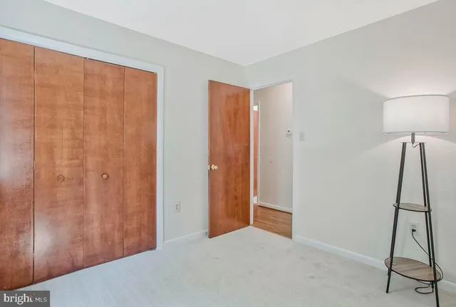 a view of a room with a wardrobe space