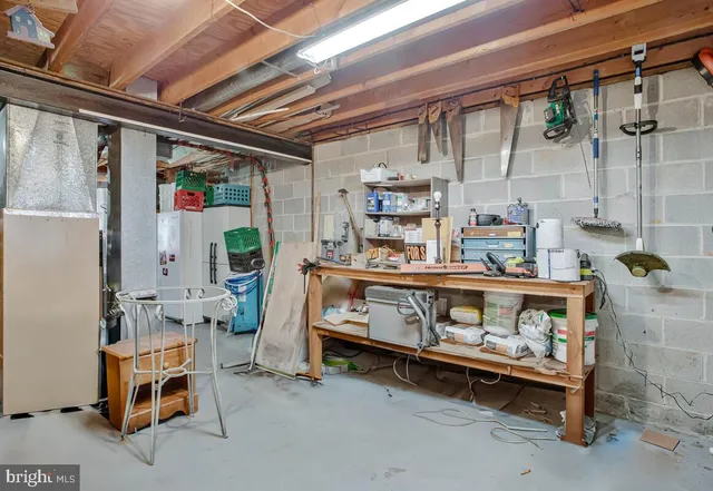 a view of a wooden deck with furniture