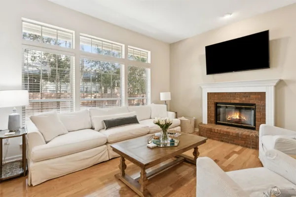 a kitchen with stainless steel appliances granite countertop a stove microwave and cabinets