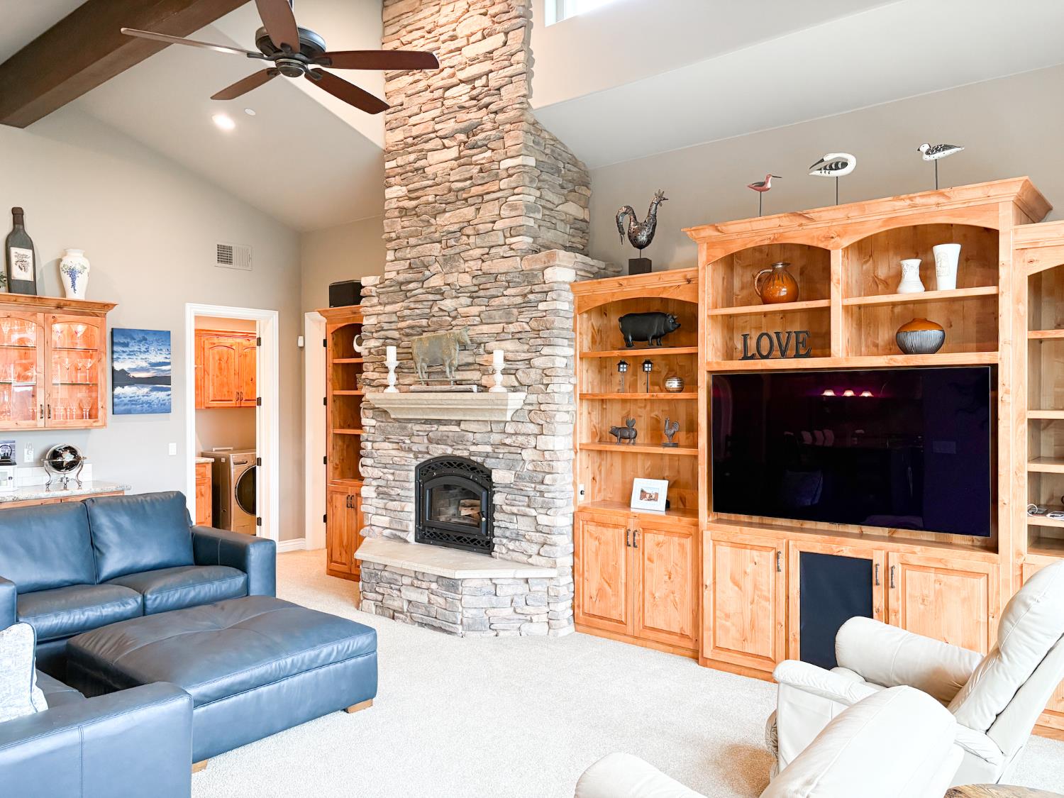 2920 Martel Creek Road Rescue, CA 95672 - Photo 14 of 69 a living room with furniture a flat screen tv and a fireplace