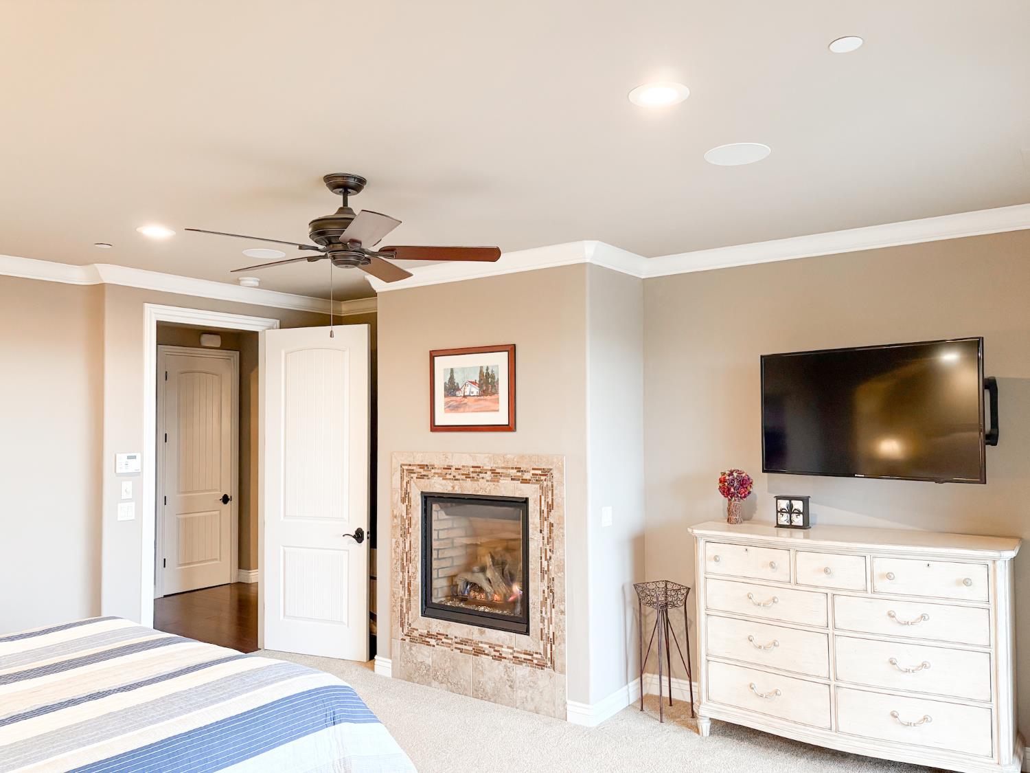 2920 Martel Creek Road Rescue, CA 95672 - Photo 22 of 69 a bedroom with a bed and a flat screen tv